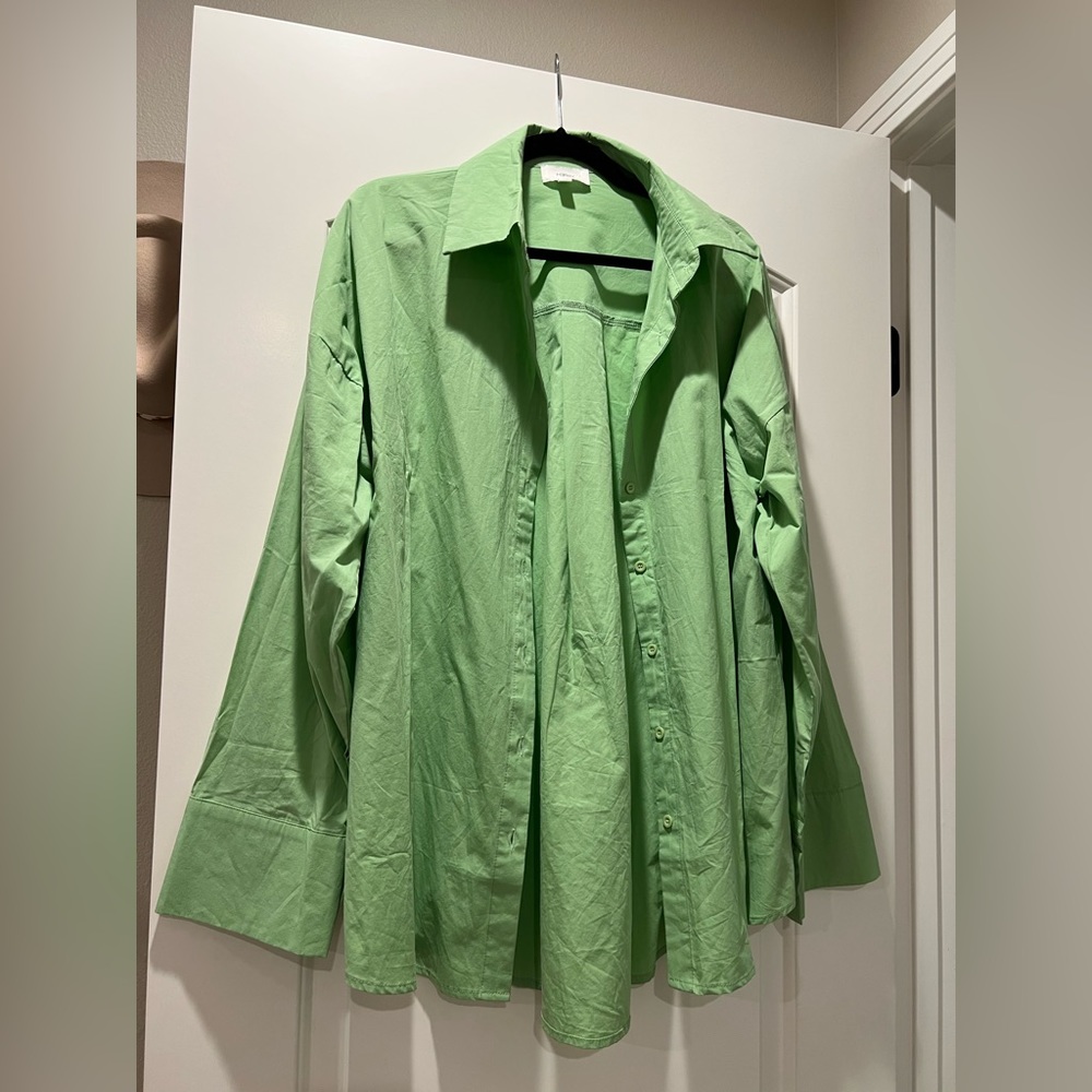 Melrose in the OC green structured button down top